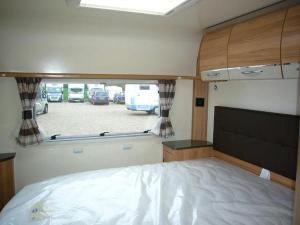 The all important bed - luxury an island bed so no climbing over each other