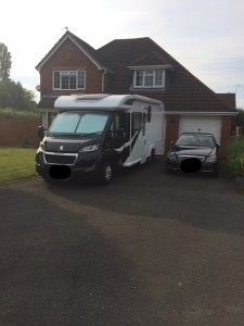 Boris parked on the drive - the car looks rather small next to him