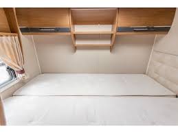 Transverse beds are generally sited over a large garage area